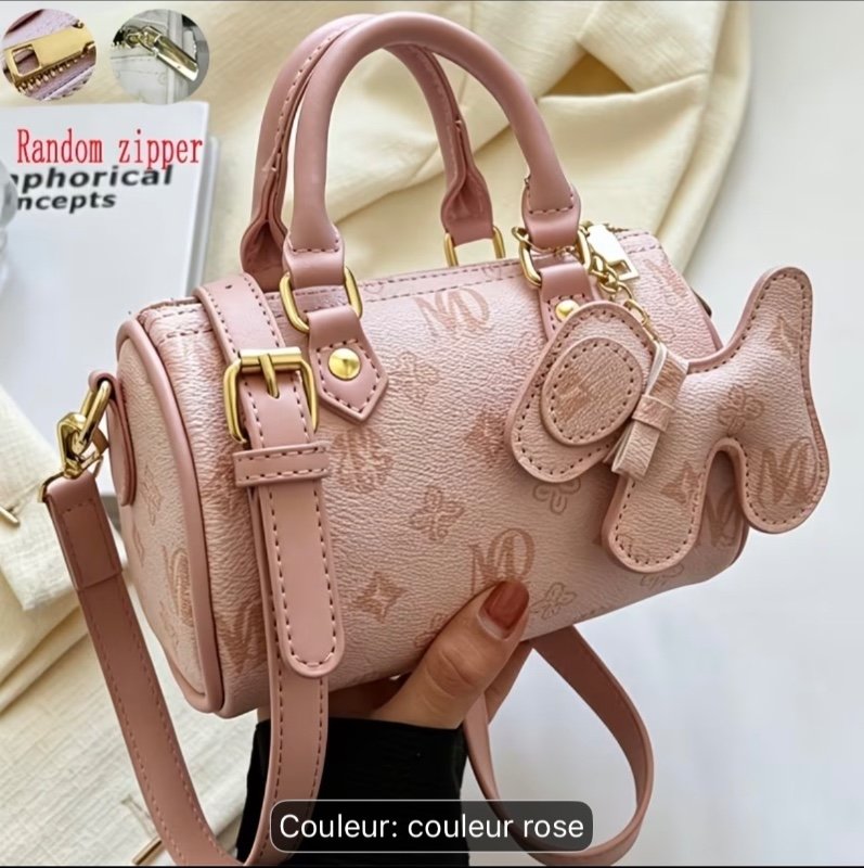 2024 Nouveau sac à main classique à la mode en forme de coussin, en matériau PU imperméable de couleur unie avec imprimé graphique de lettres et pendentif animal. Convient pour le shopping, peut être porté en bandoulière. Convient pour le shopping,