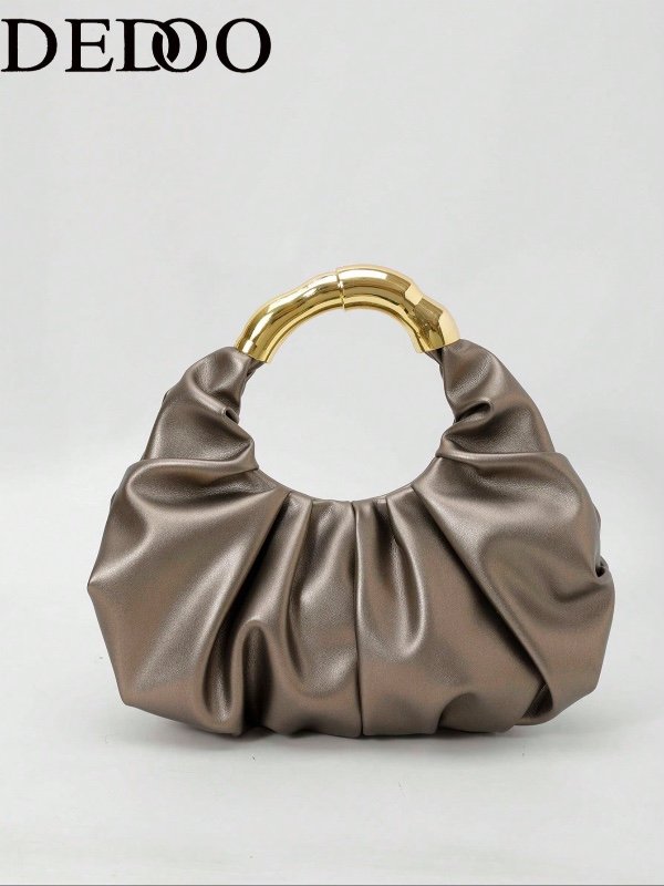 Sac à main avec poignée dorée