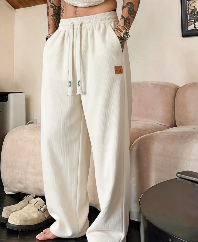 Pantalon en velours côtelé pour homme, style toutes saisons, pantalon à coupe droite ample et décontractée, coupe large, style tendance et décontracté, pantalon long polyvalent.