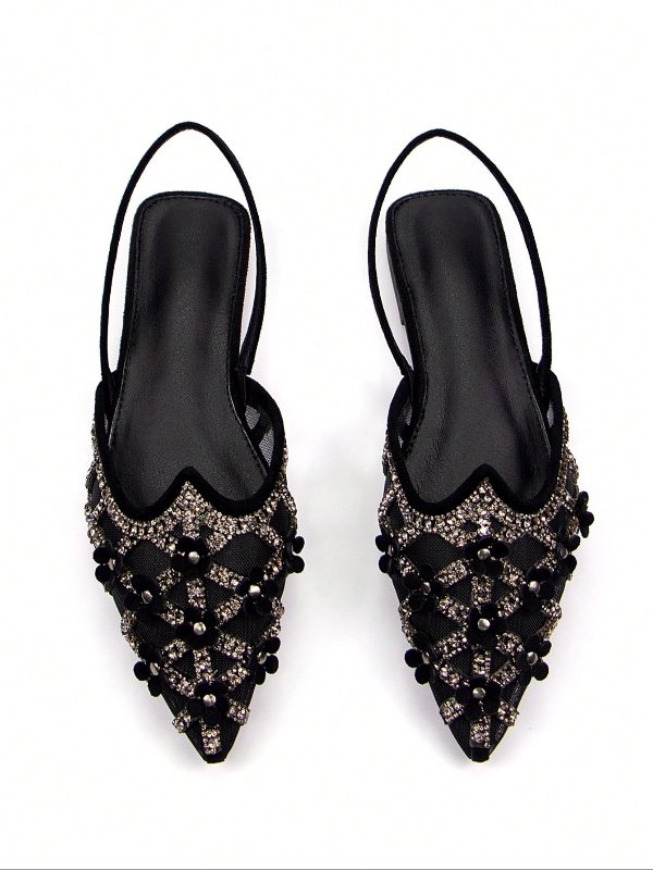 Mules plates noires en velours pour femme (Automne 2025) – Style glamour, bout pointu, bride arrière et ornements floraux incrustés de strass